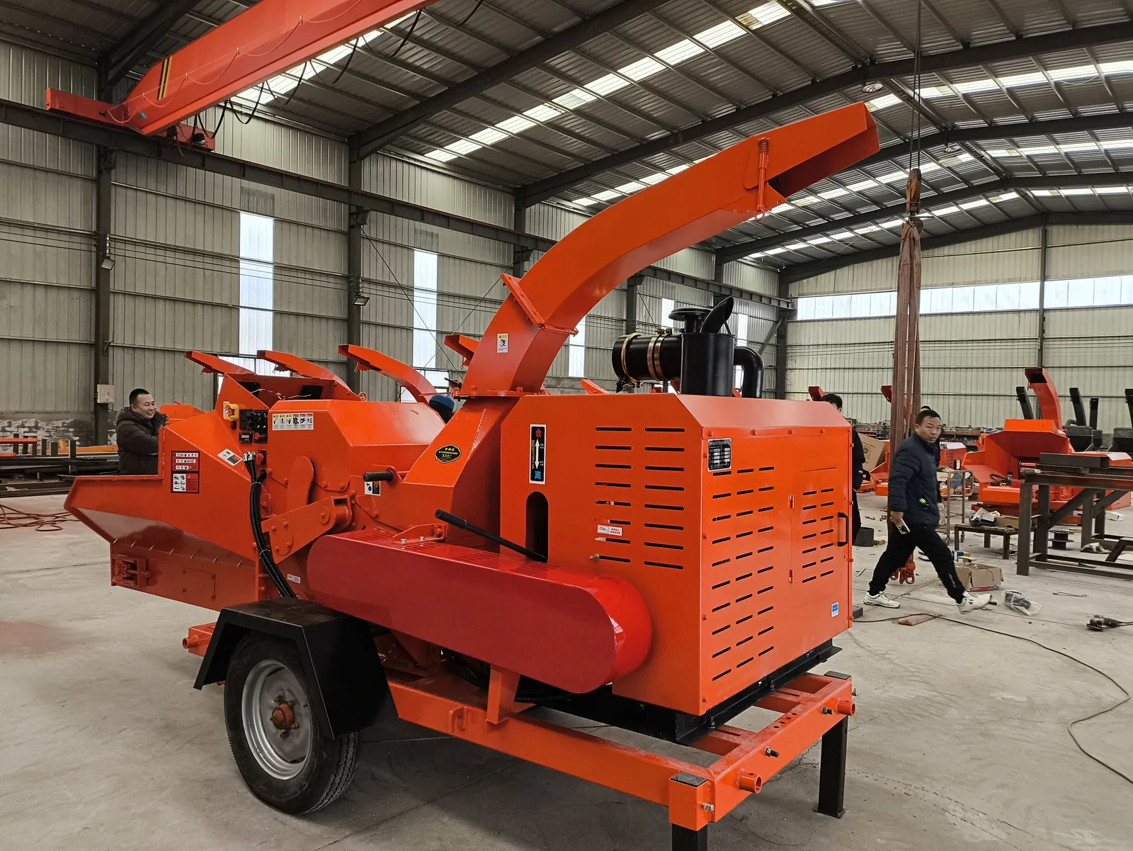 Cronus chain-feed wood chipper photographed in the manufacturing workshop