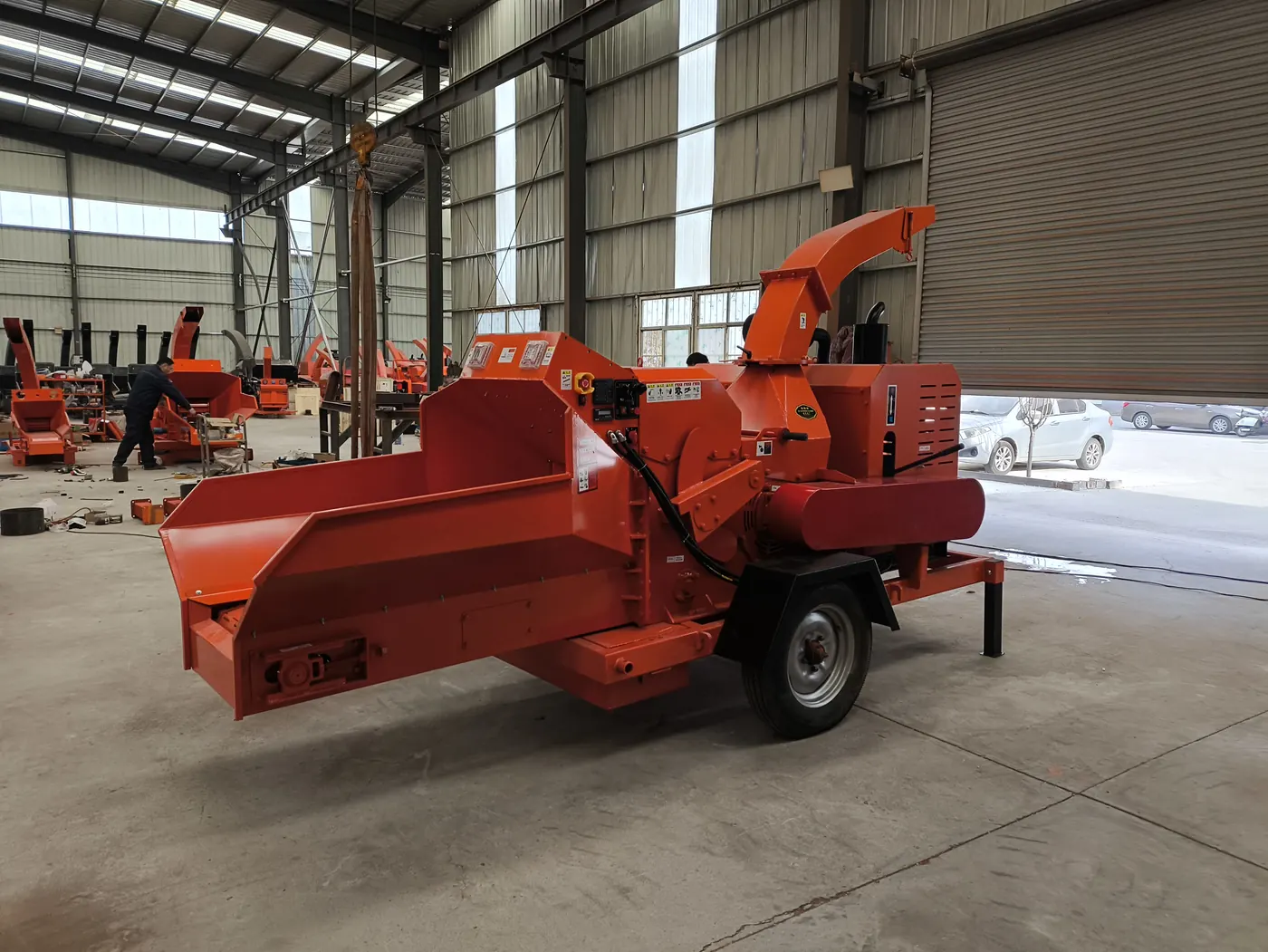 Mobile wood chipper prepared for branch processing